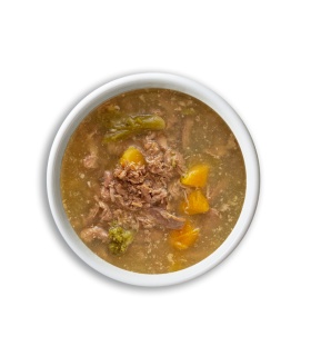 Comida húmeda natural para perros con carne de pavo y verduras.